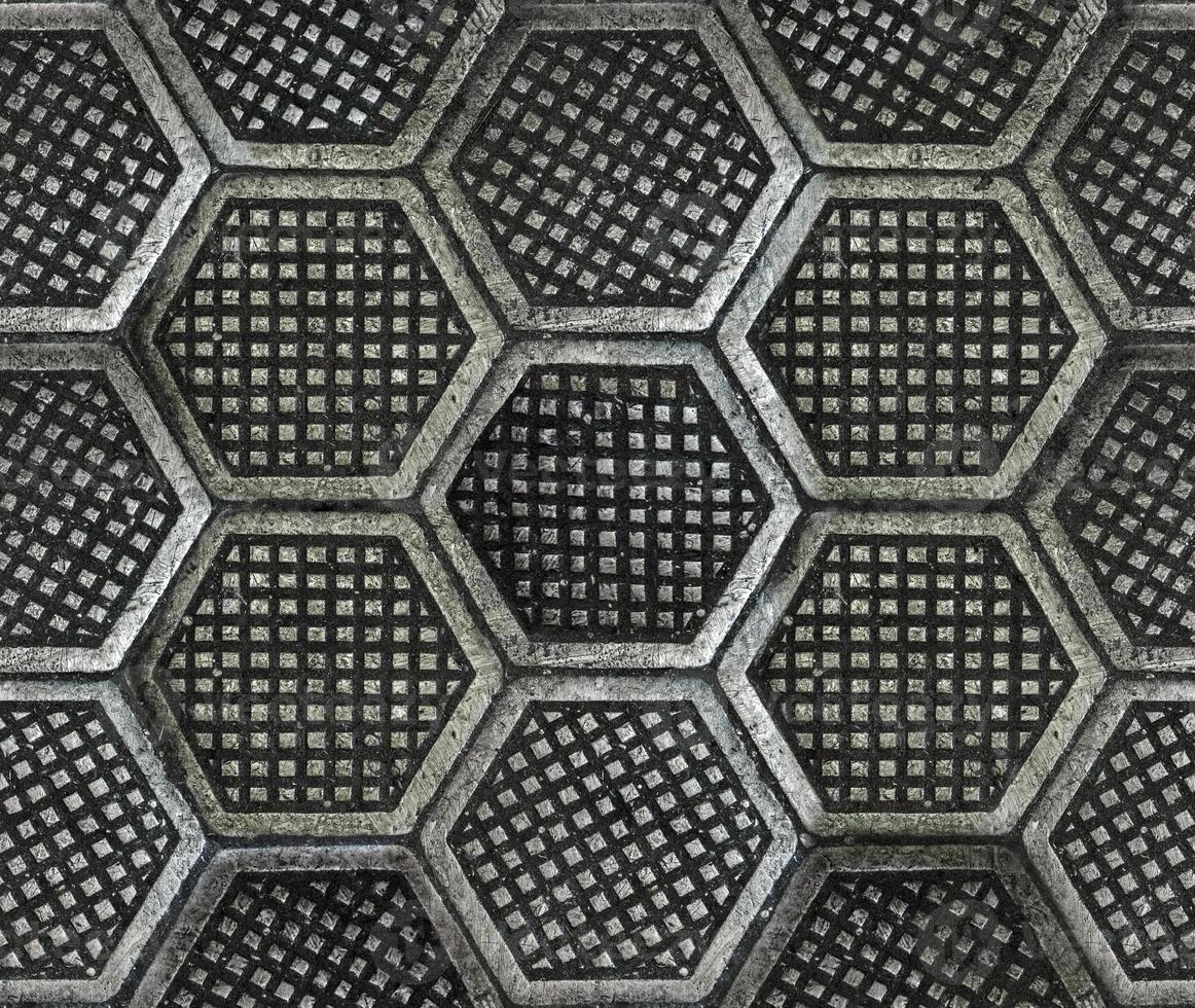 Cast iron hexagonal factory floor texture. photo