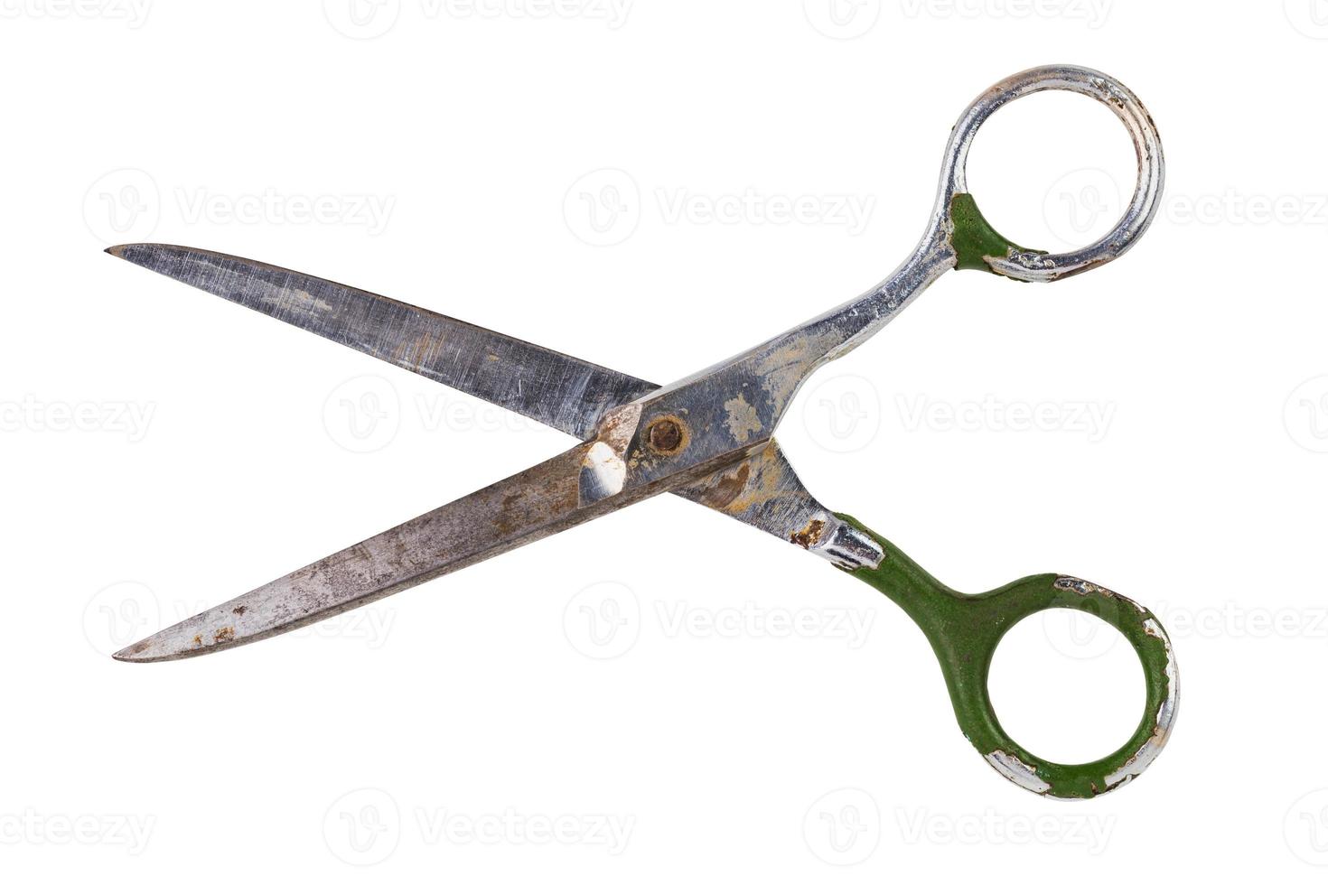 Single old soviet scissors isolated on white background. Opened. photo