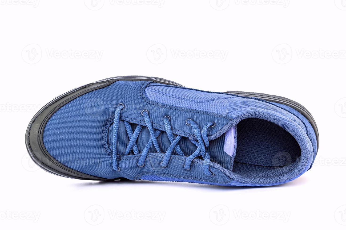 right cheap simple cyan hiking or hunting shoe isolated on white background - view from above photo