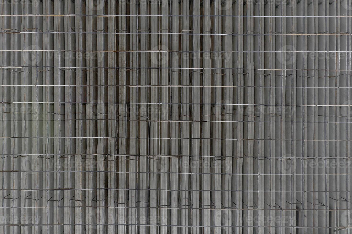 Large flat profiled sheet armature reinfoced floor before concrete fill. Flat texture. photo