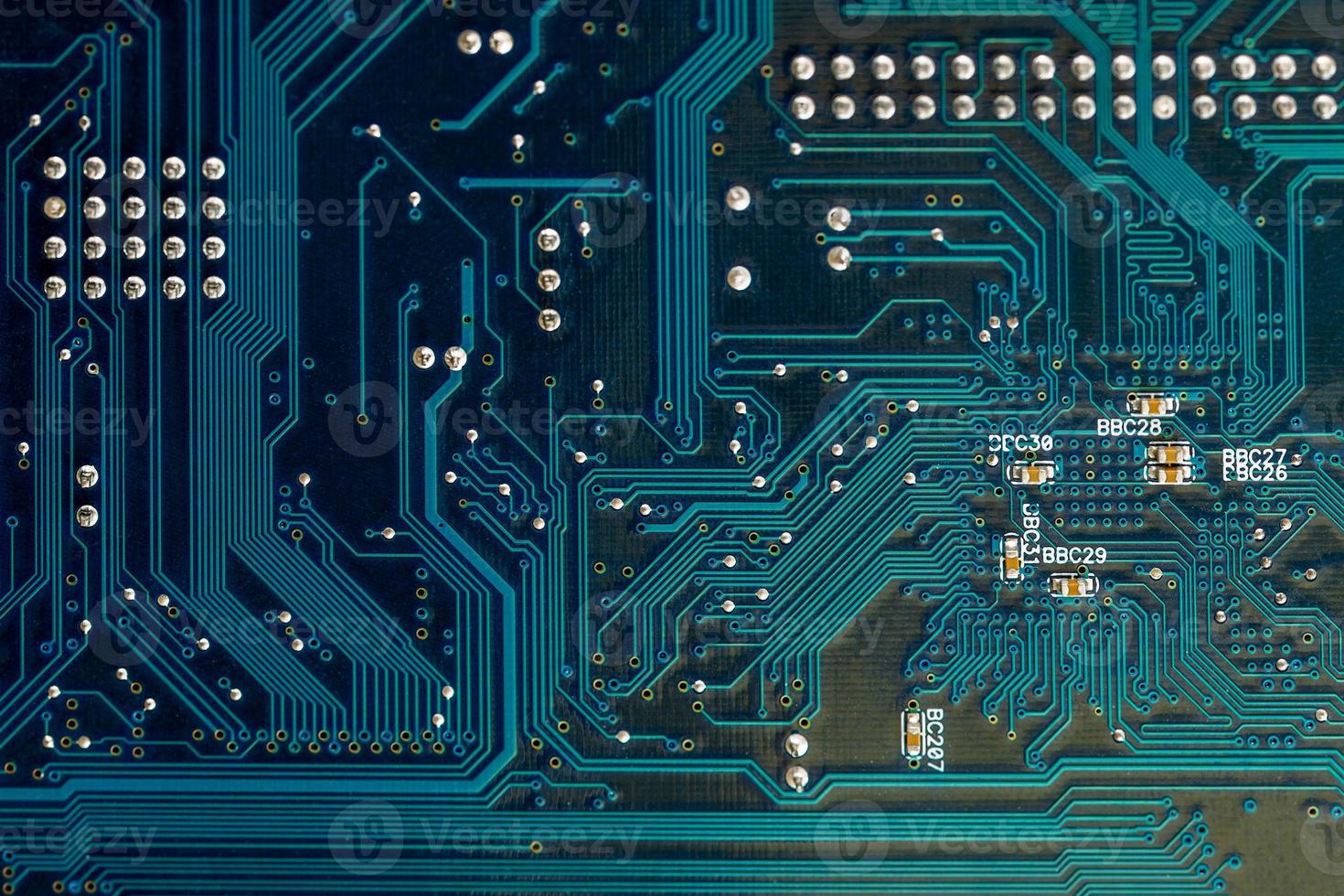 blue pcb board circuit close up technology background photo