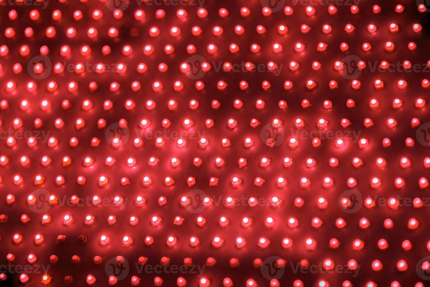 cheap outdoor red screen led panel with individual diodes, full frame close-up view with selective focus photo