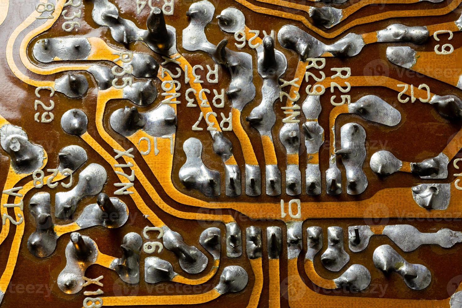 old flat pcb without components with selective focus photo