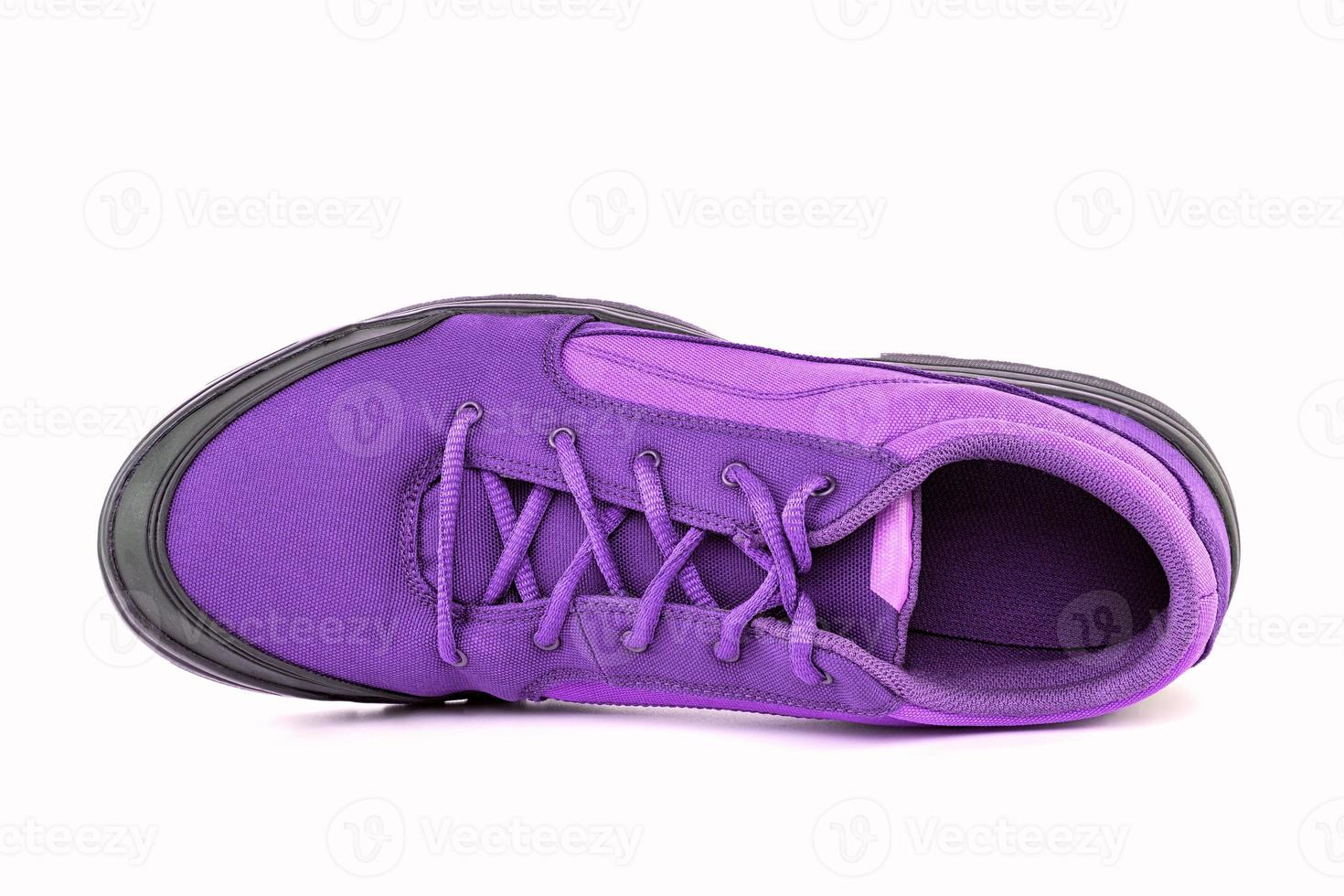 right cheap violet hiking or hunting shoe isolated on white background - view from above photo