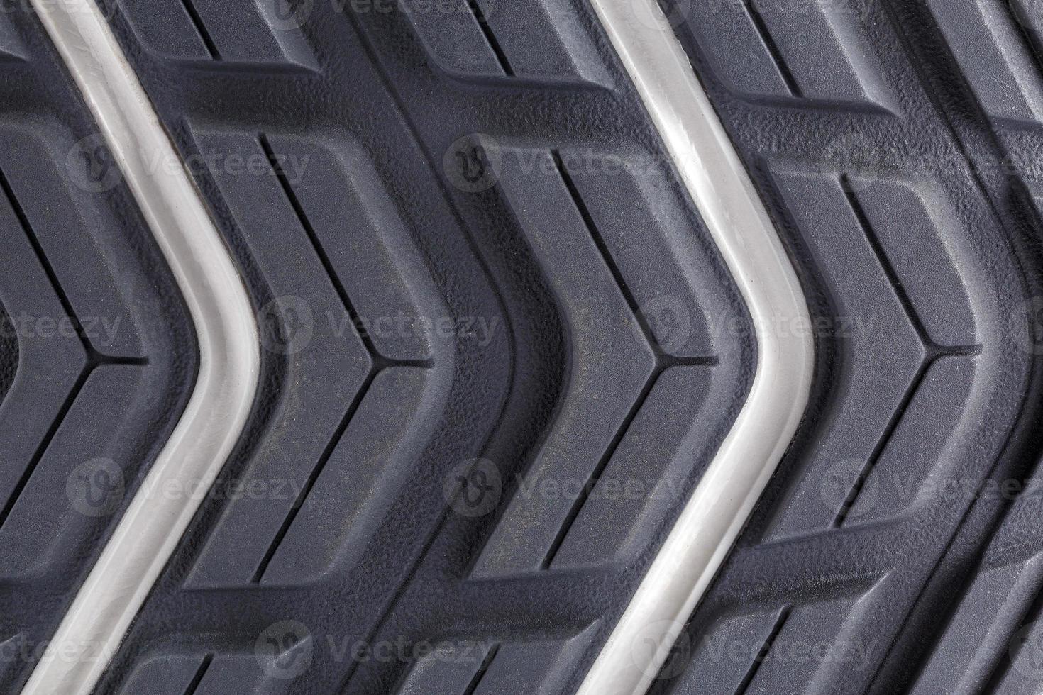 close-up full frame background of new generic contemporary sneakers outsole with protector shapes photo