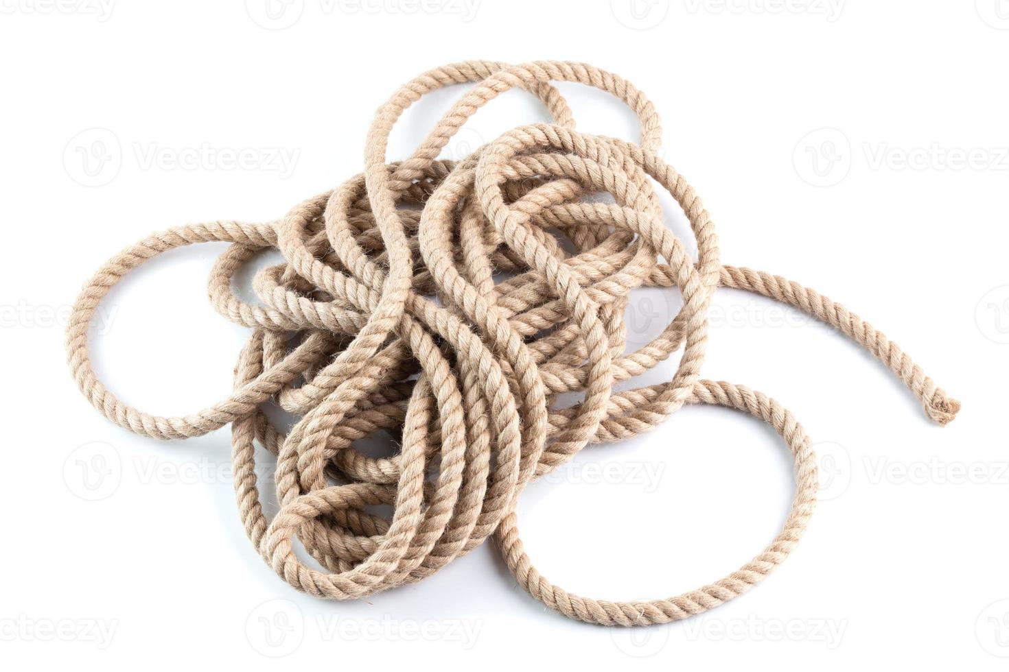 coil of natural Jute Hessian Rope Cord Braided Twisted isolated on white background photo