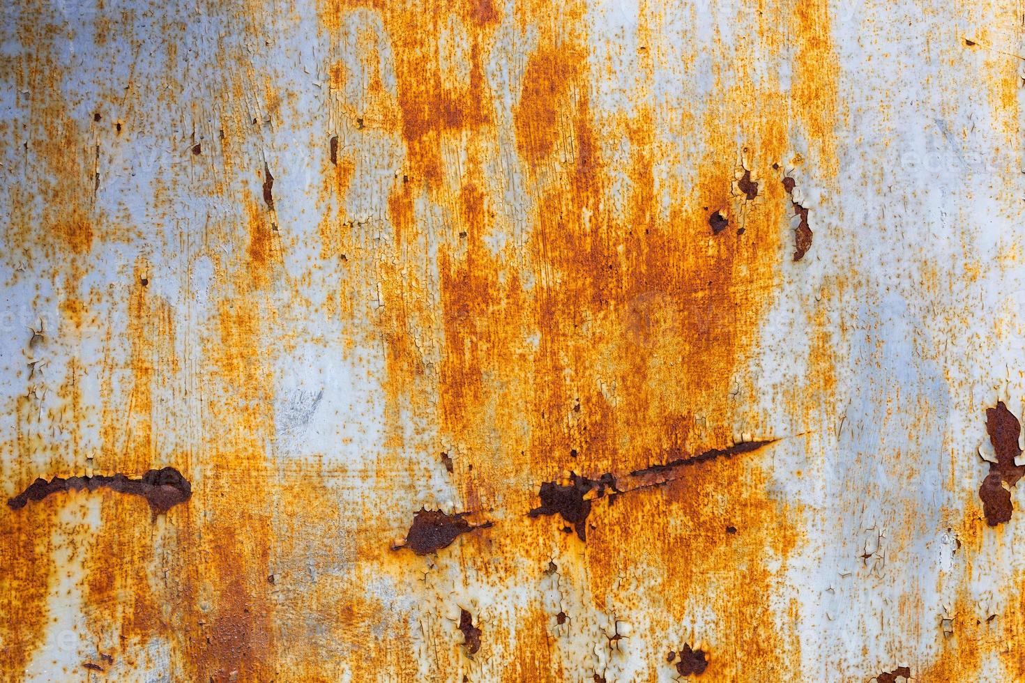 abstract background and texture of white steel surface with orange rust
