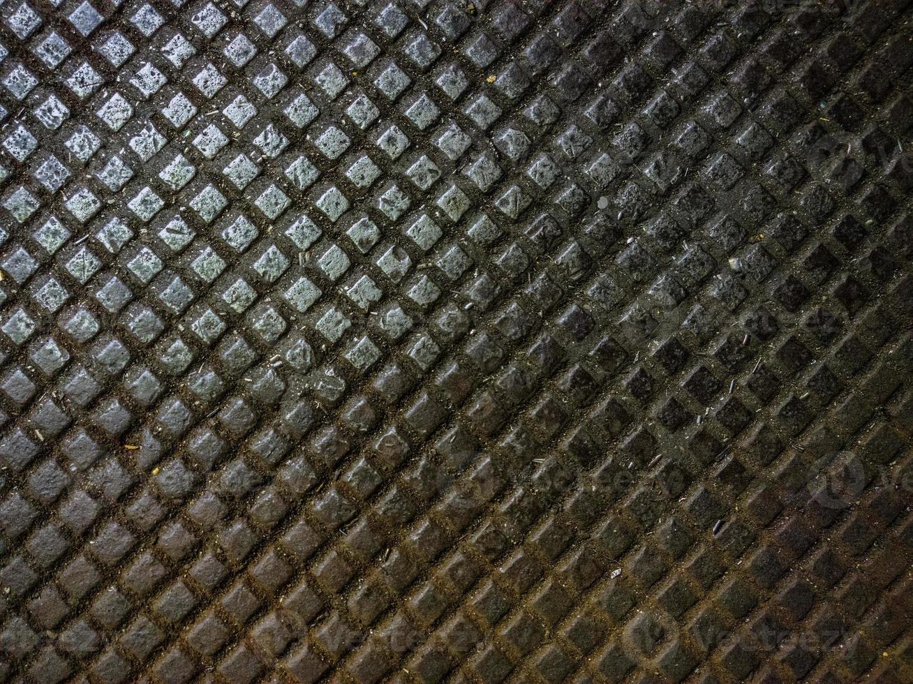 Dirty metal cast iron floor plate background photo