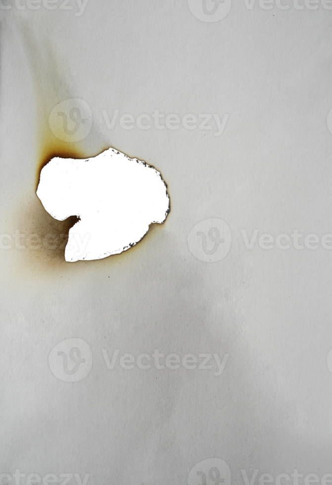 burnt paper frame for texture overlay. damaged white paper with burnt stain in transparent background. blank ripped paper edge for a design element. png