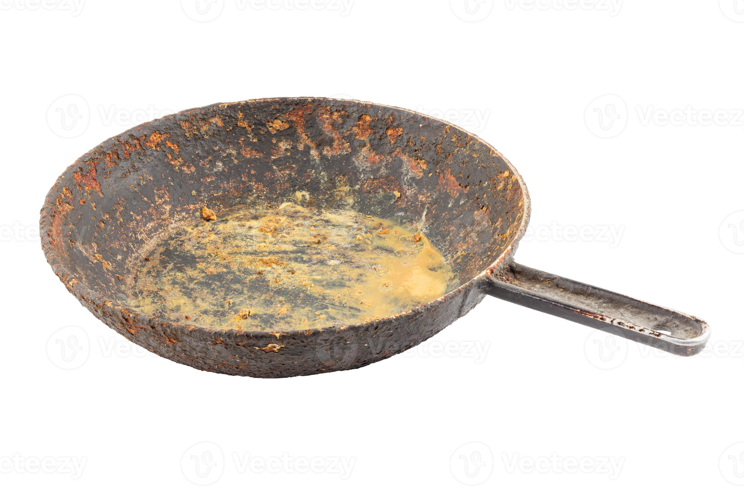 https://static.vecteezy.com/system/resources/previews/012/634/851/large_2x/old-disgusting-stained-rusty-cast-iron-pan-with-burnt-fat-and-food-leftovers-isolated-photo.jpg