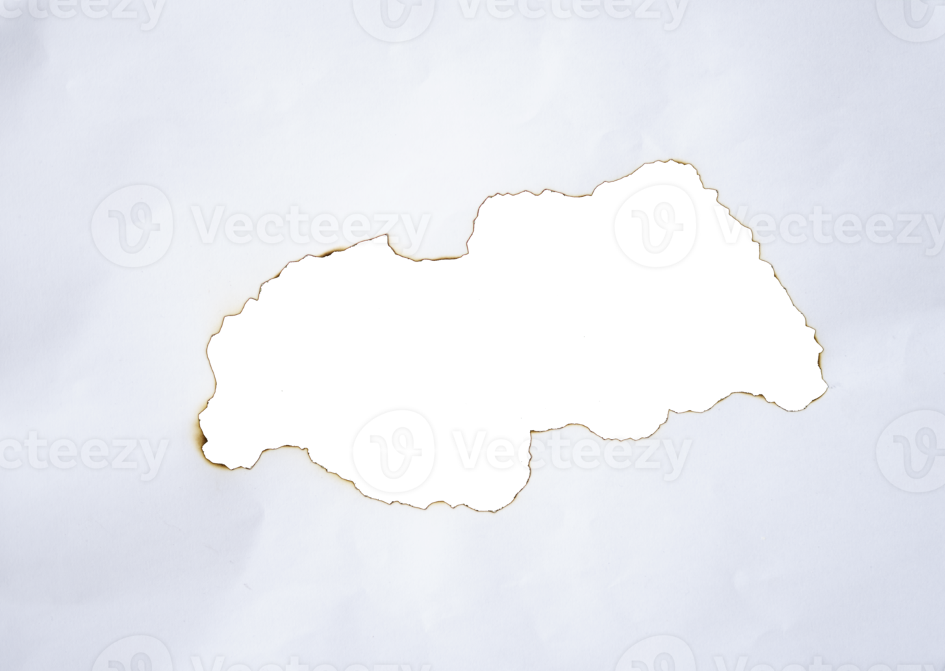 burnt paper frame for texture overlay. damaged white paper with burnt stain in transparent background. blank ripped paper edge for a design element. png