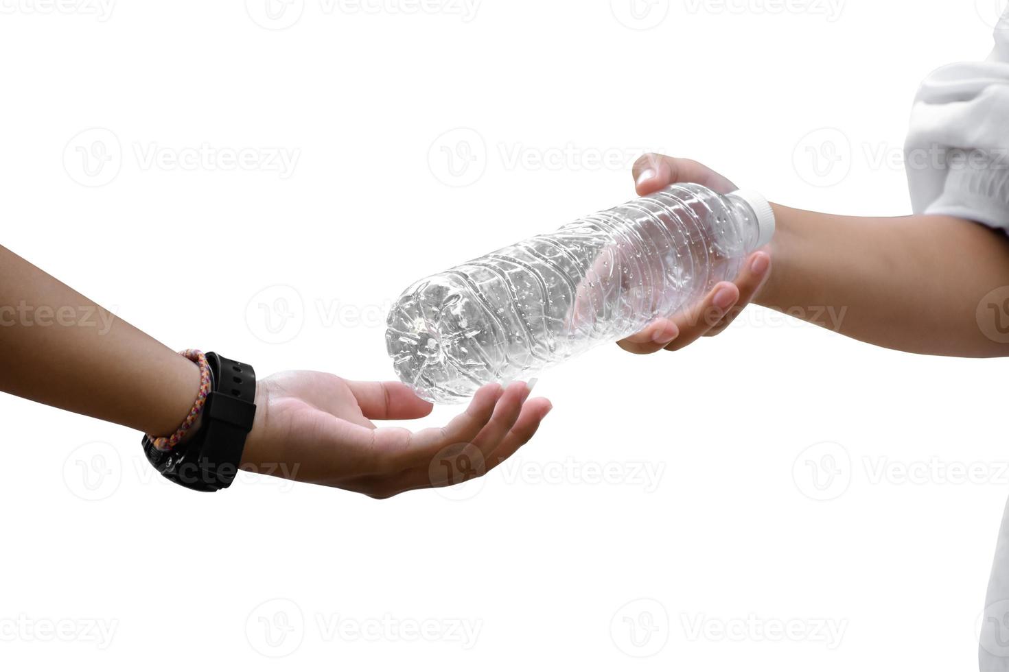 Giving plastic bottle to make recyclying, reusing and reducing objects to lower garbage and to keep our environment clean and clear to everyone concept, soft and selective focus. photo