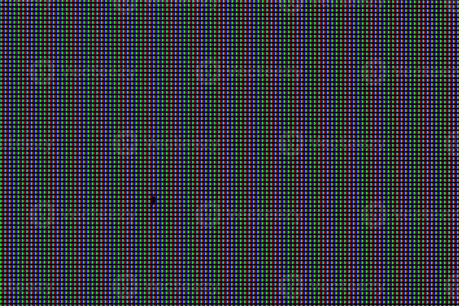true macro photo of ips lcd screen structure with surface black defect or dent