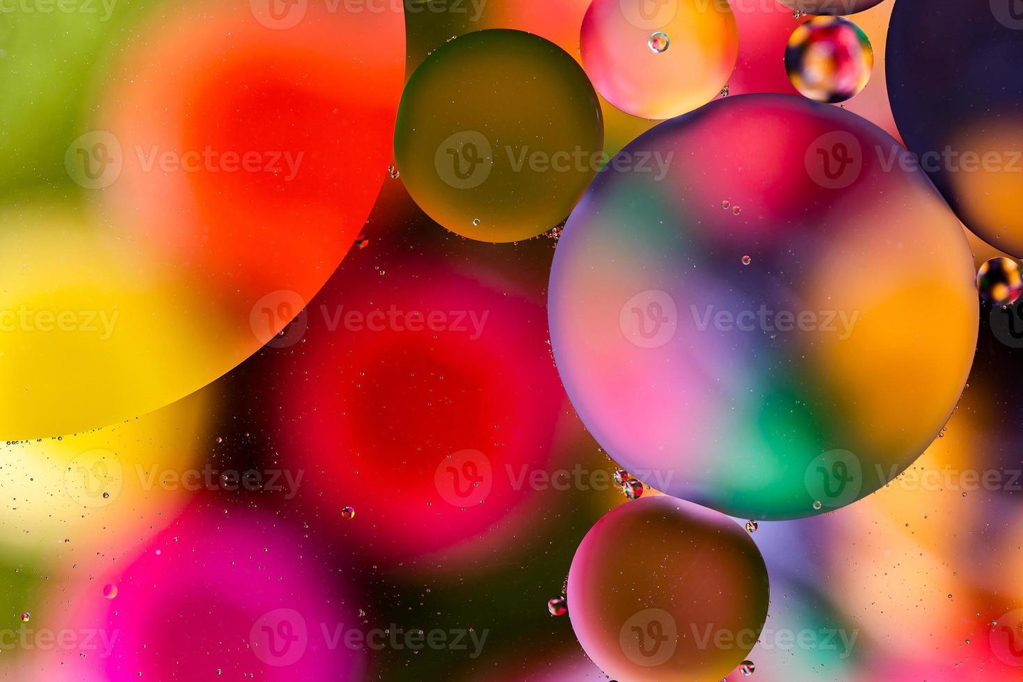 colorful surface with abstract round shapes structure of oil in water photo
