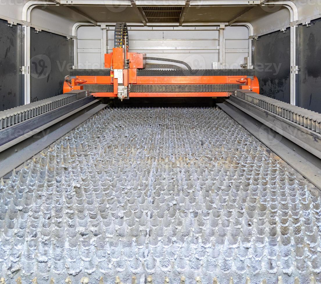 inside of empty cnc laser cutting machine - without workpiece metal sheet photo