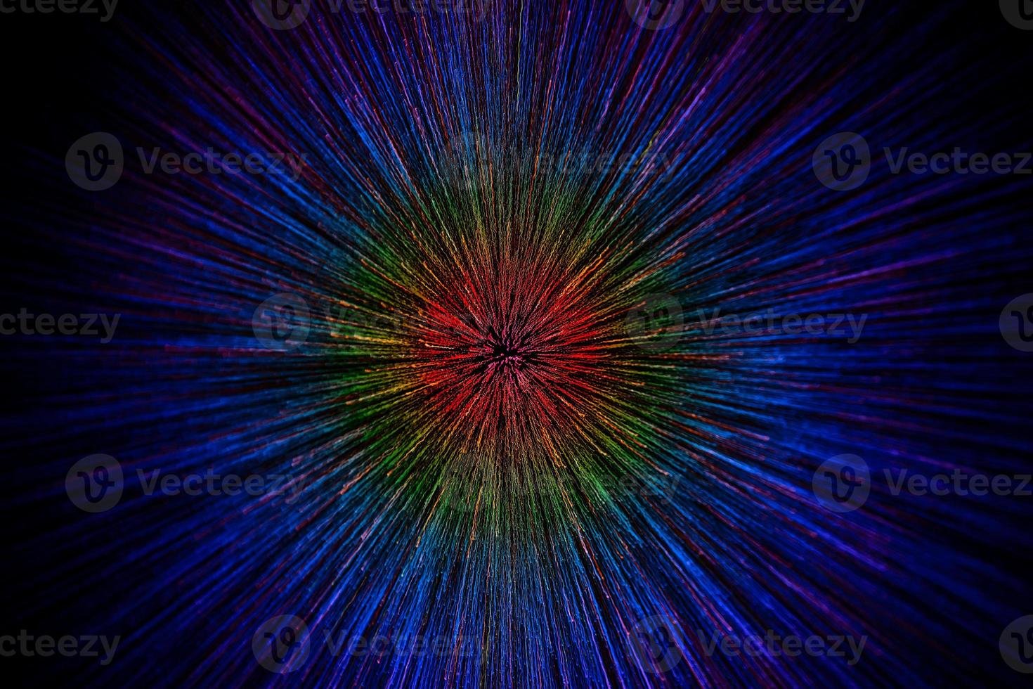 natural lens zoom explosion radial gradient color blurred dots on black background with selective focus photo