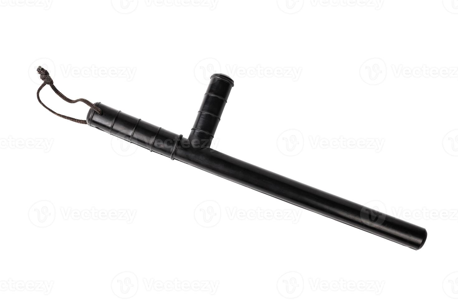 Black classic rubber police tonfa baton isolated on white background in top-down flat lay perspective. photo