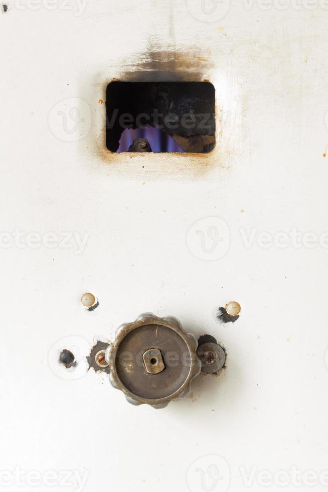 Fired up old russian gas water heater photo