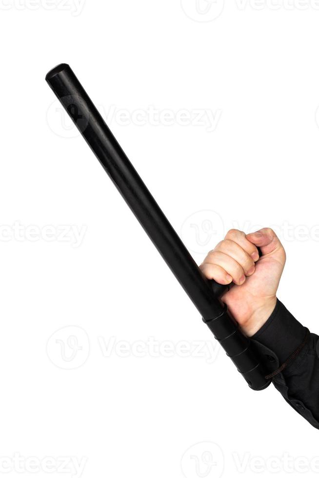 hand in black shirt with black rubber police baton isolated on white background photo