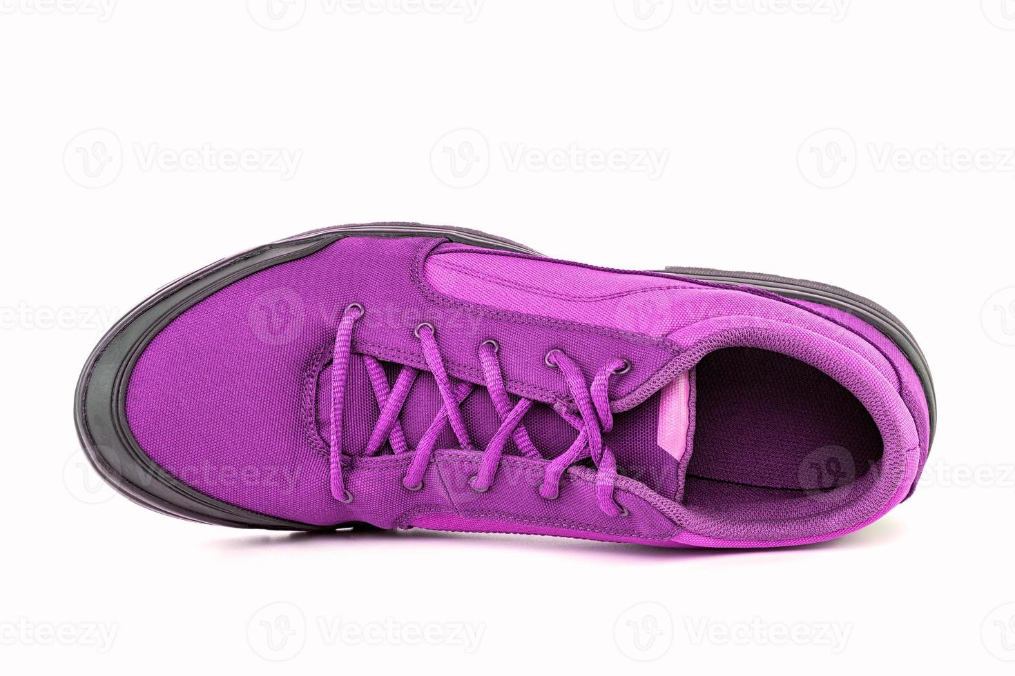 right cheap pink hiking or hunting shoe isolated on white background - view from above photo