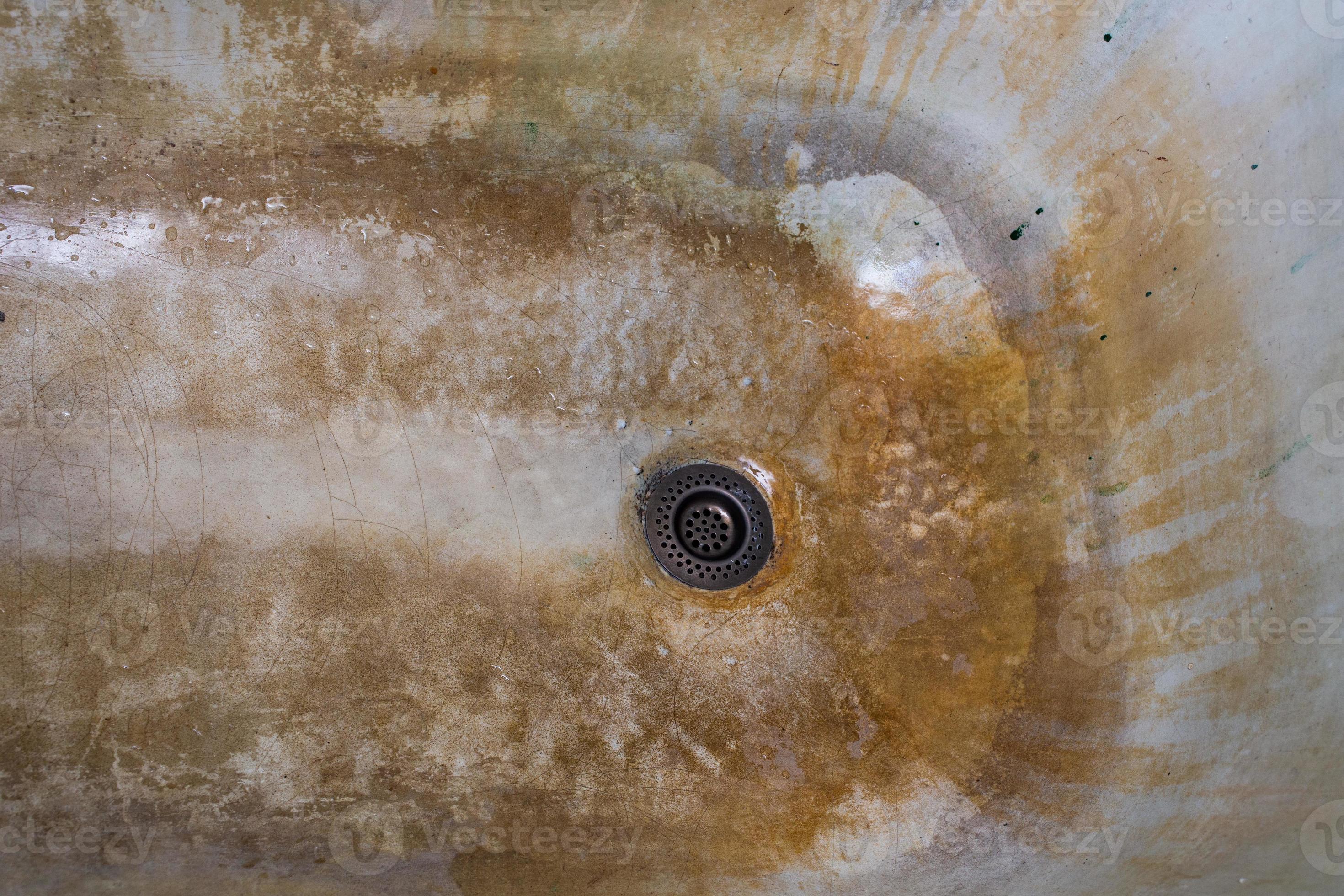 old rusted and stained cast iron bathtub closeup 12638207 Stock Photo