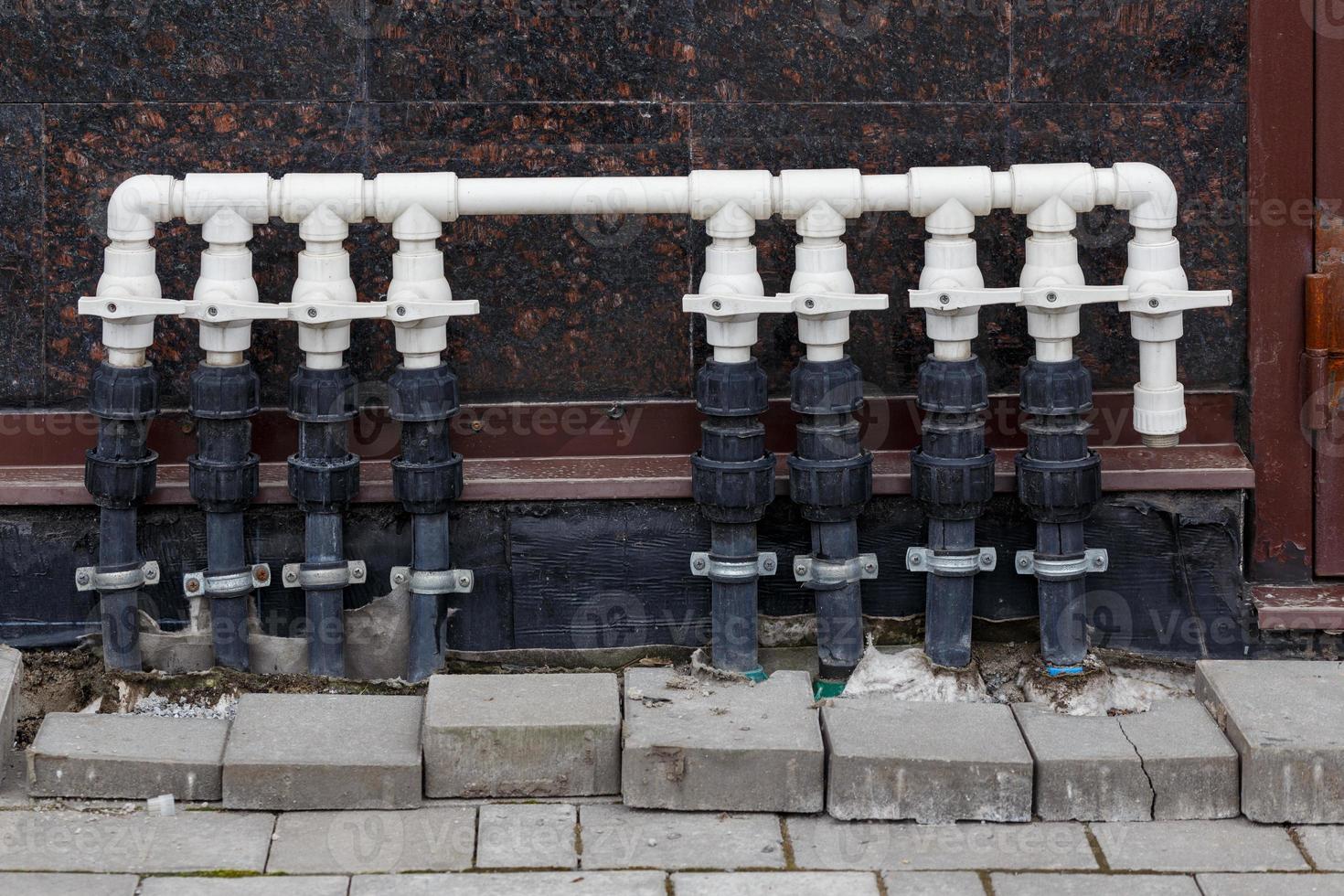 white plastic pipe with row with many photo