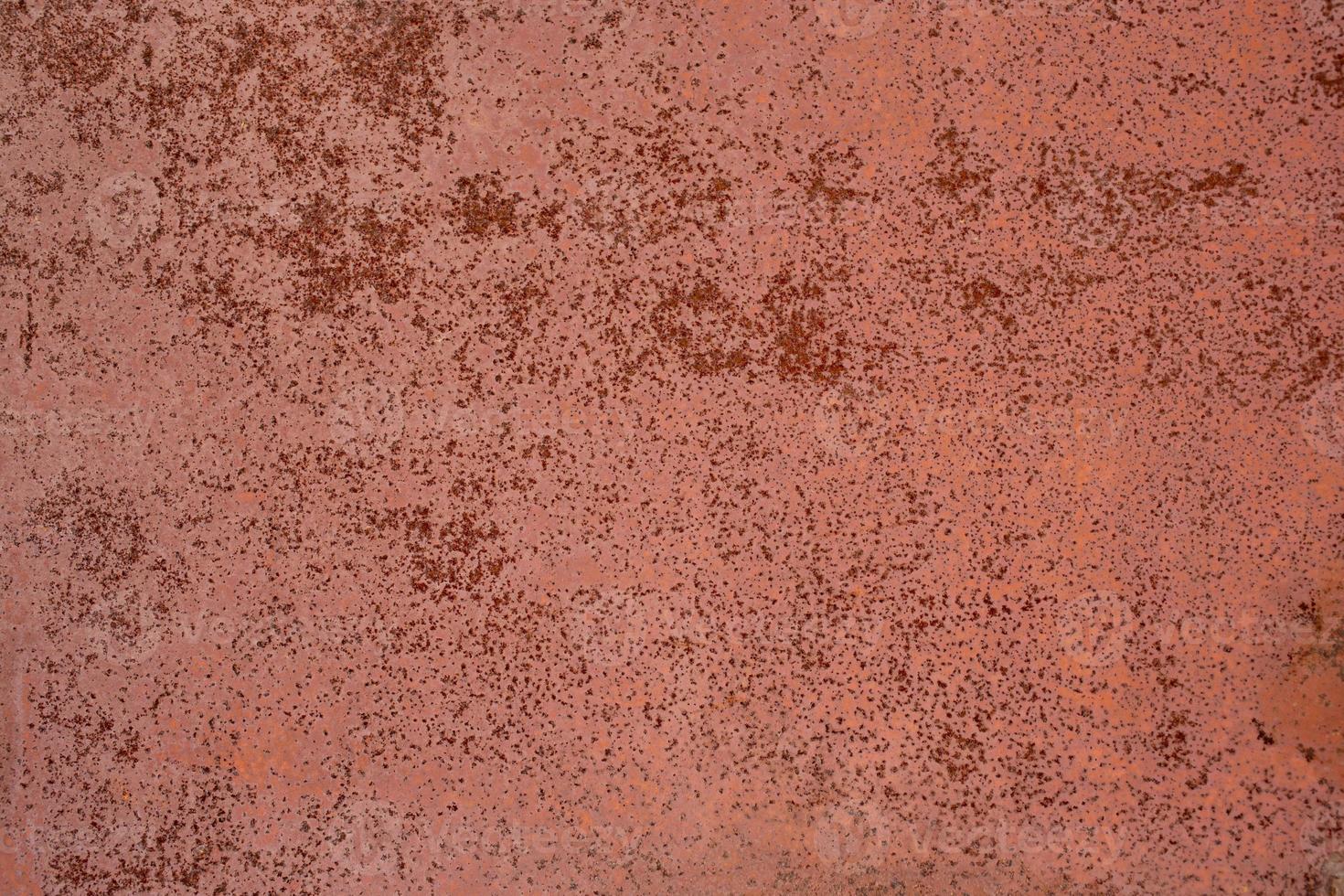 flat dry red rusted iron surface close-up background and texture photo