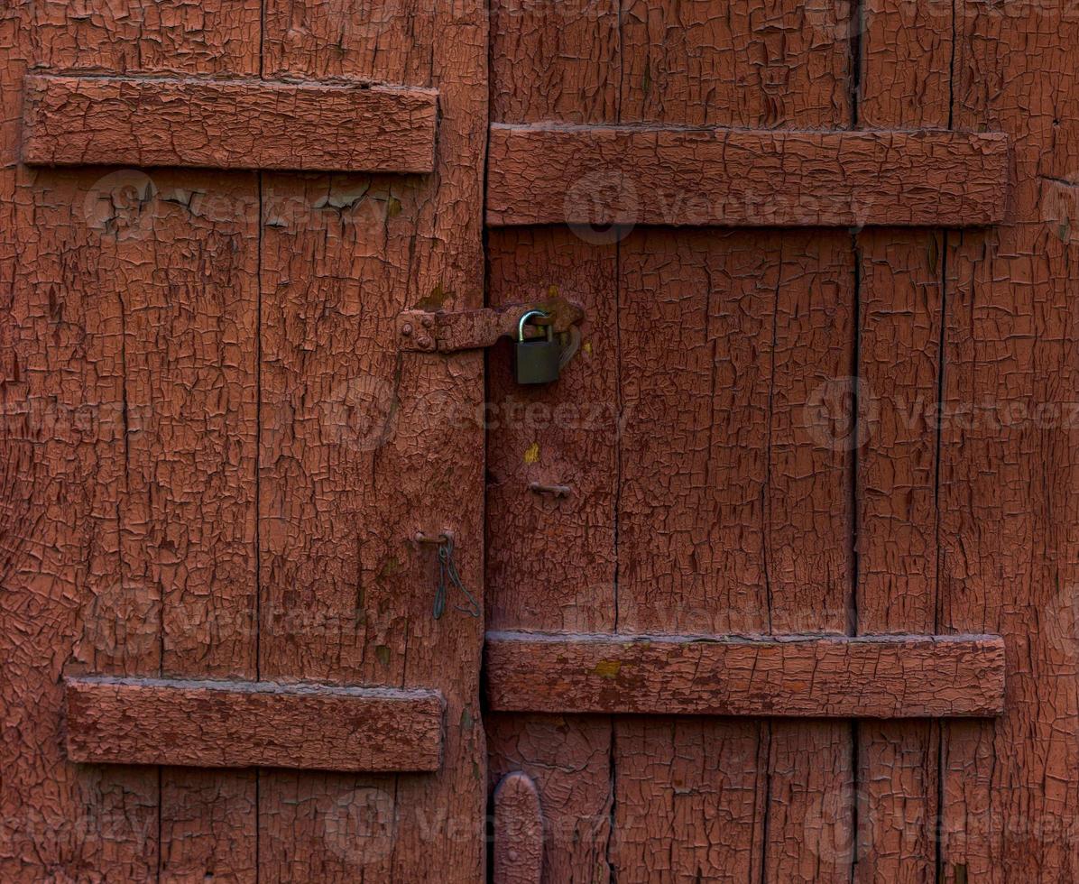 Old brown closed shutters photo