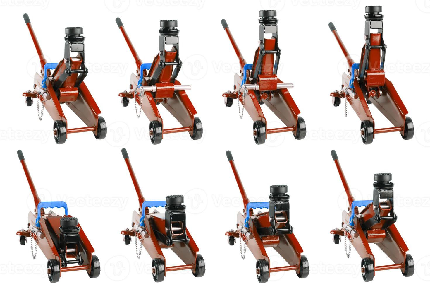 set of red isolated hydraulic car jacks on white background raised in different heights photo
