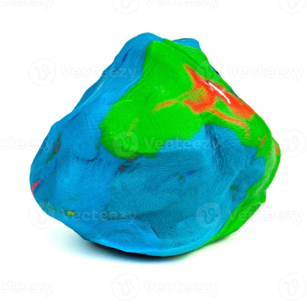 Mixed blue-green-red playdough ball with distinct finger prints isolated on the white background photo