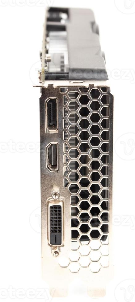 closeup view of modern video card's external connectors with selective focus and isolated on white background photo