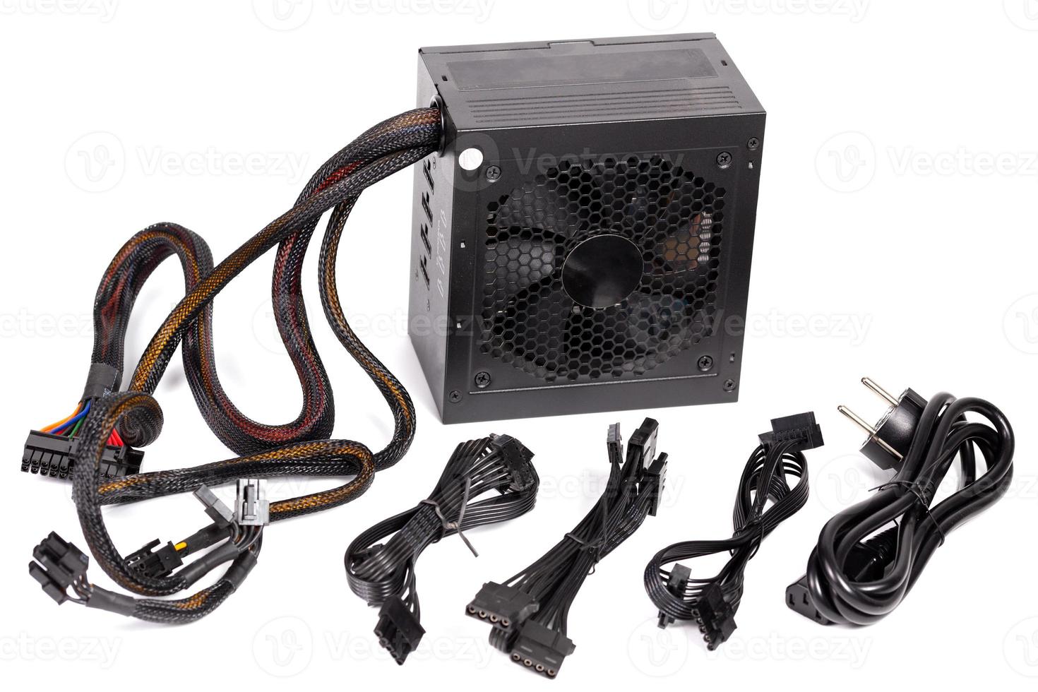 pc atx half-modular power supply isolated on white background with selective focus photo