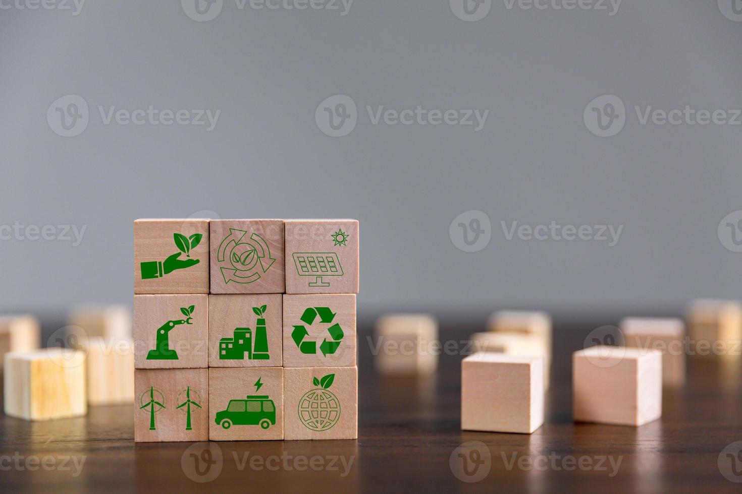 Companies are targeting net zero greenhouse gas emissions. Carbon credit concept.Tradable certificate to drive industry in direction of low emissions in efficiency cost. Wooden cubes with decrease CO2 photo