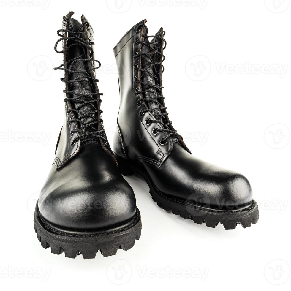 three quarter front view on pair of black leather 10-inch new black military combat boots, isolated on white background photo