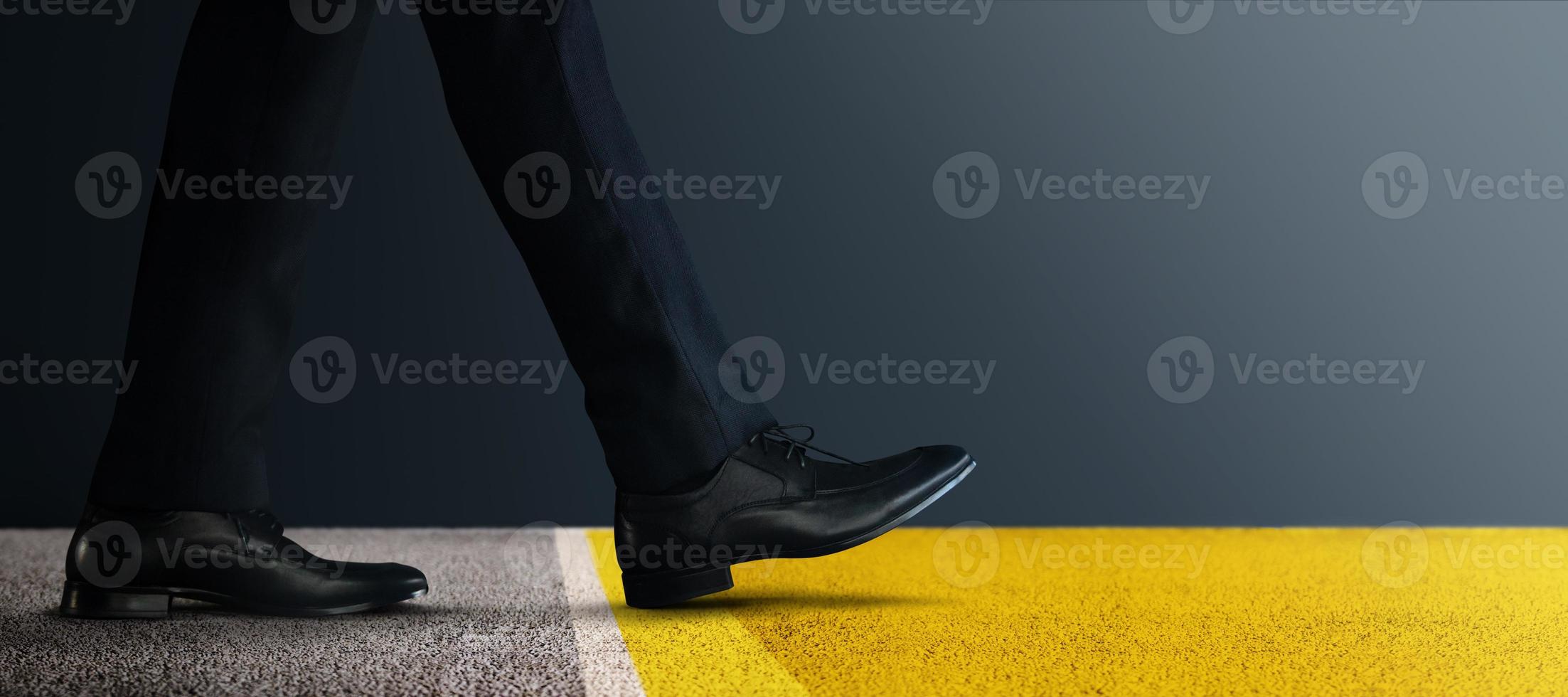 Start Concept. Low Section of Businessman Steps into Start Line and Moving Forward to New Challenge. Cropped Image. Side View. Business Strategy, Metaphor Conceptual for Restart photo