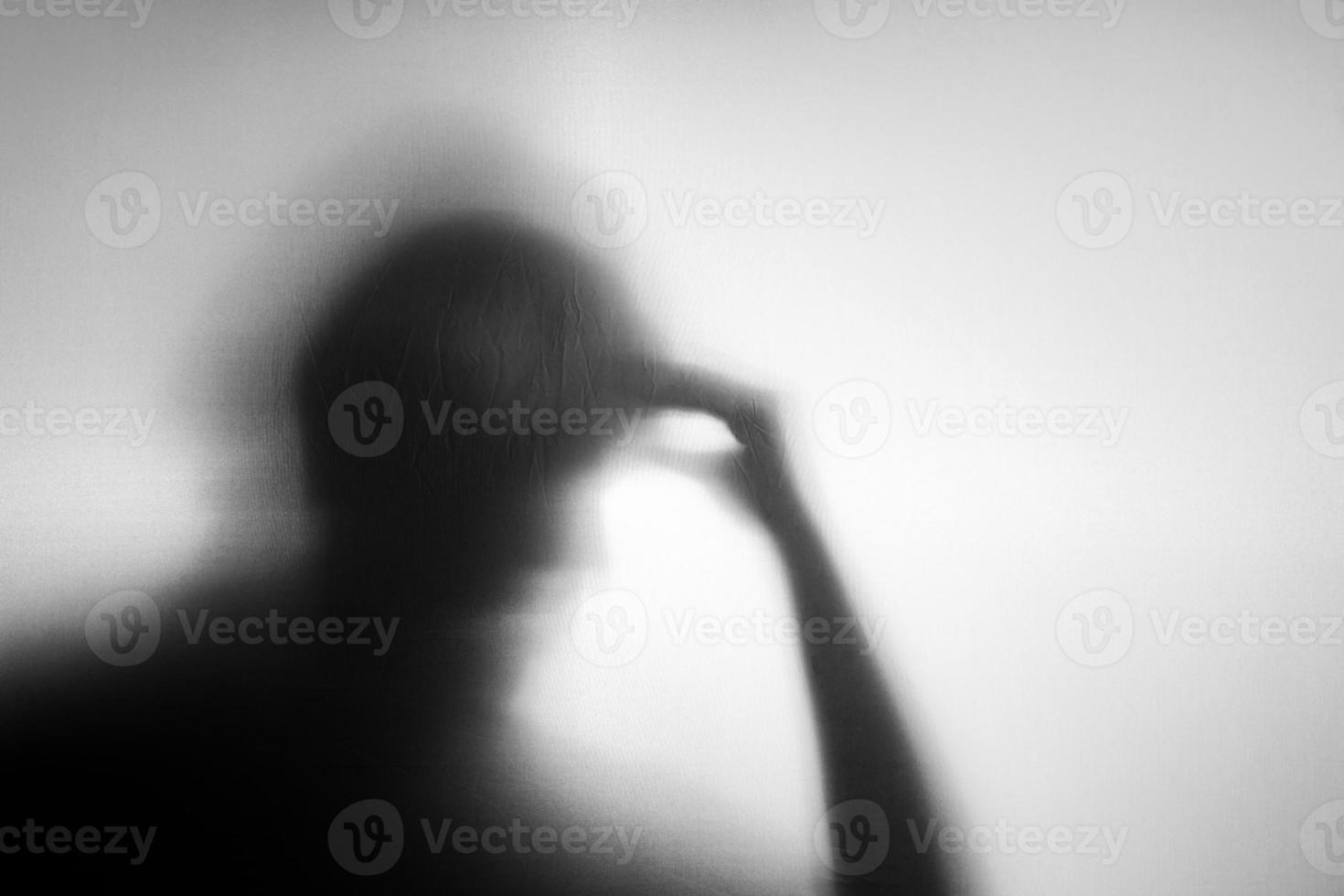 Conceptual Photo. Motion Blurred image. Silhouette of Senior Elderly Person who as Parkinson or Alzheimer Disease. Memory Loss from Dementia. Brain Function Decline photo