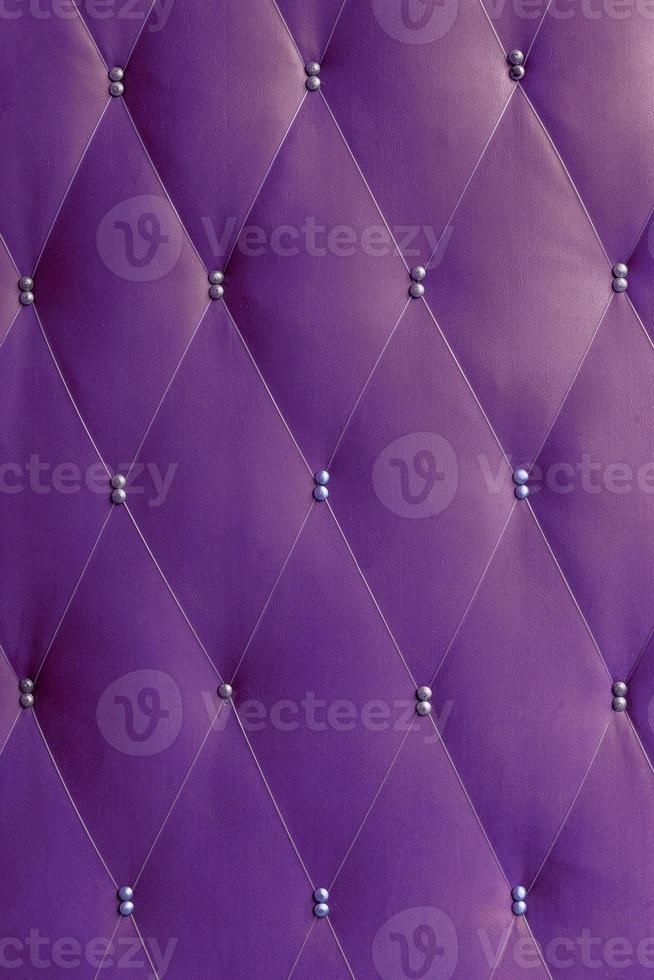 Soviet soft purple dermantine front door with a banner of fishing line and nails - full frame background and texture photo