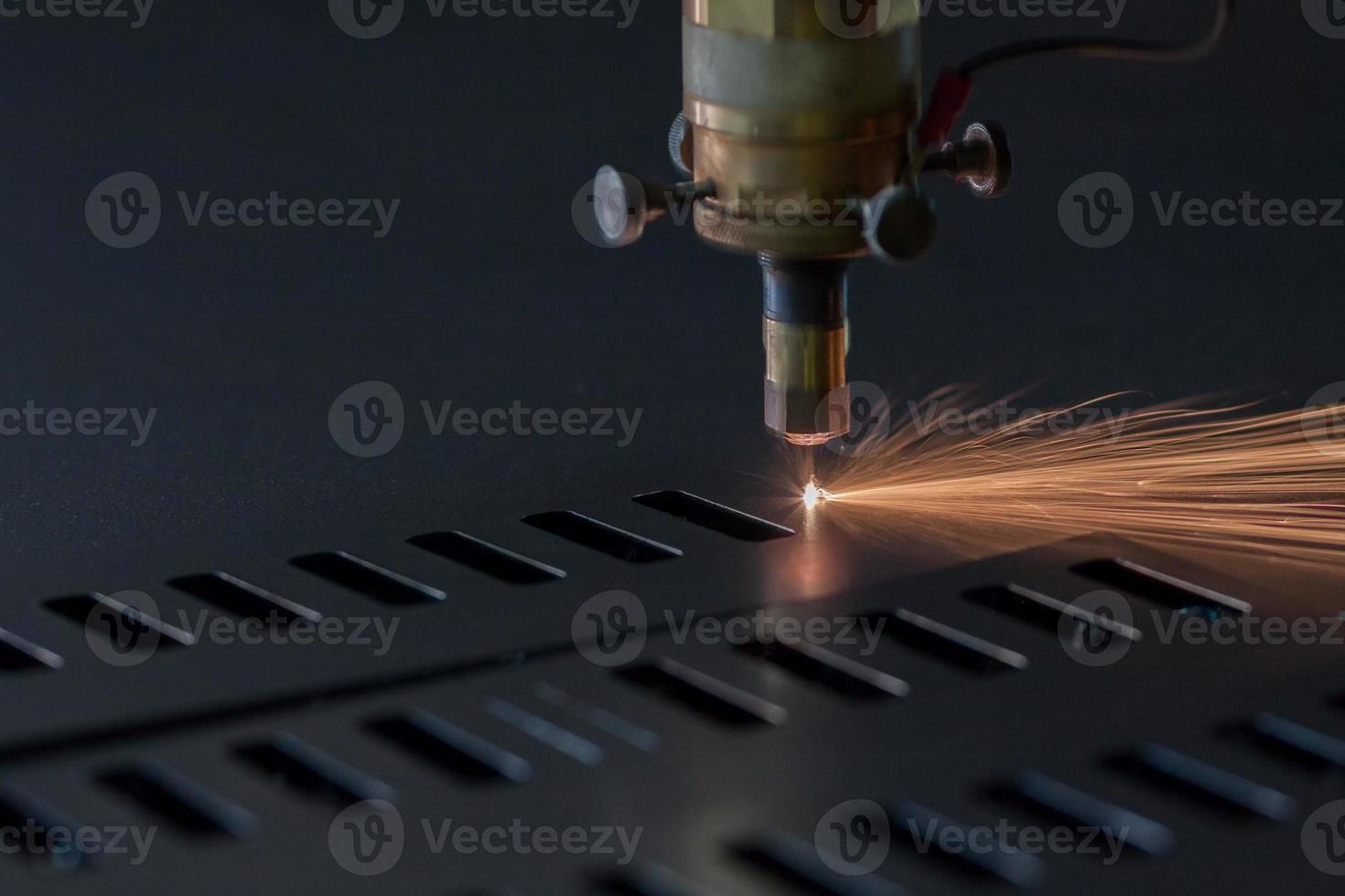 Process of industrial laser cutting of sheet metal photo