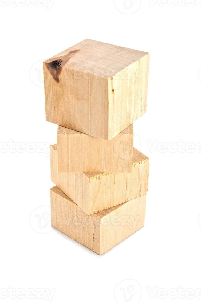 stack of wooden bricks or leftoovers isolated on white backgroun photo
