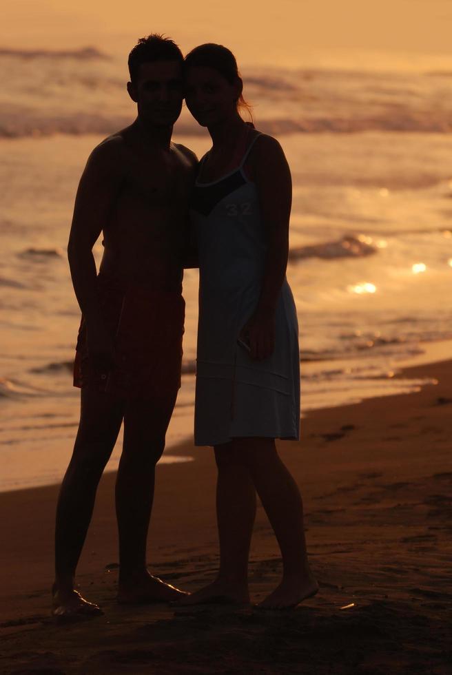 romantic couple on beach photo