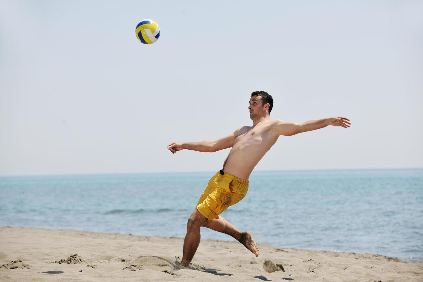 male beach volleyball game player photo