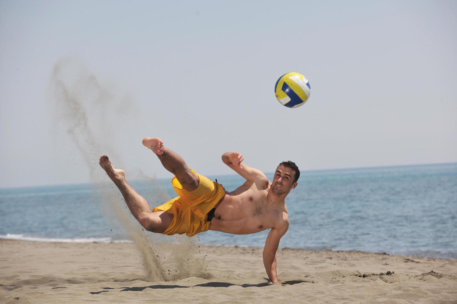 male beach volleyball game player photo