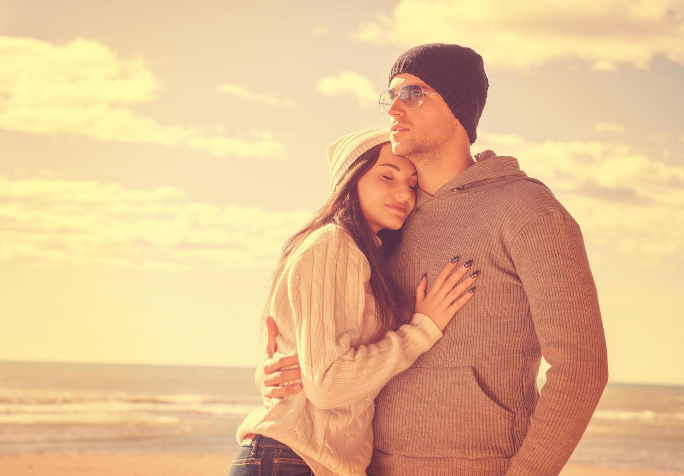 Couple chating and having fun at beach bar photo