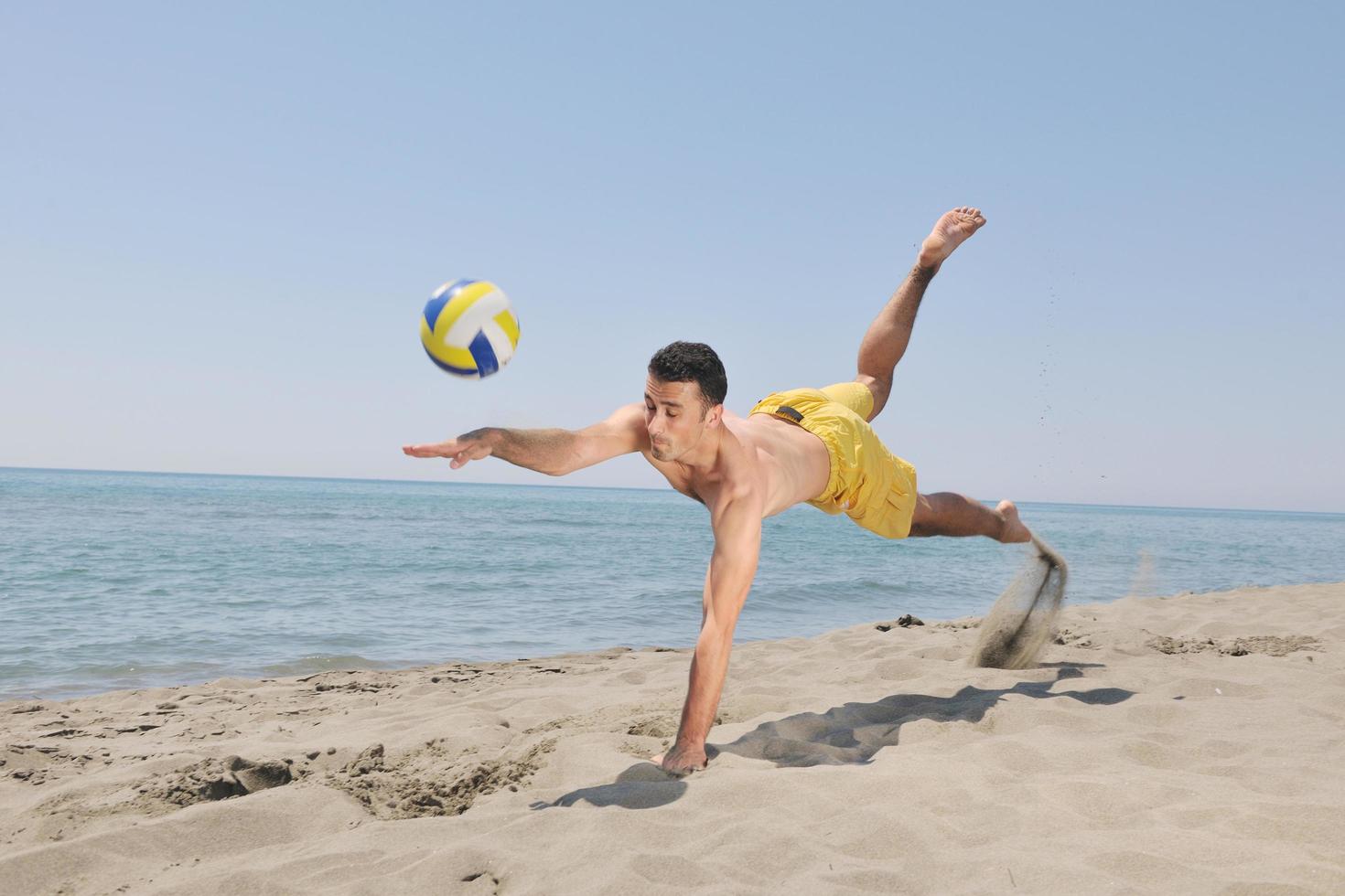 male beach volleyball game player photo