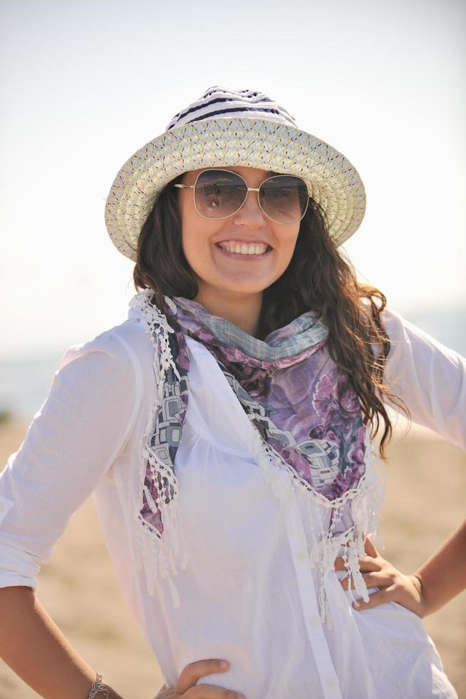 happy young woman on beach photo