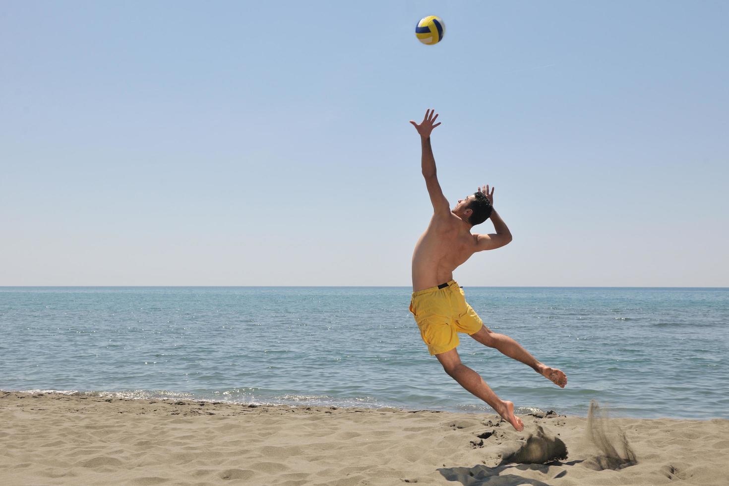 male beach volleyball game player photo