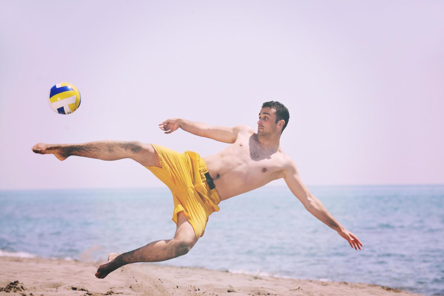 male beach volleyball game player photo