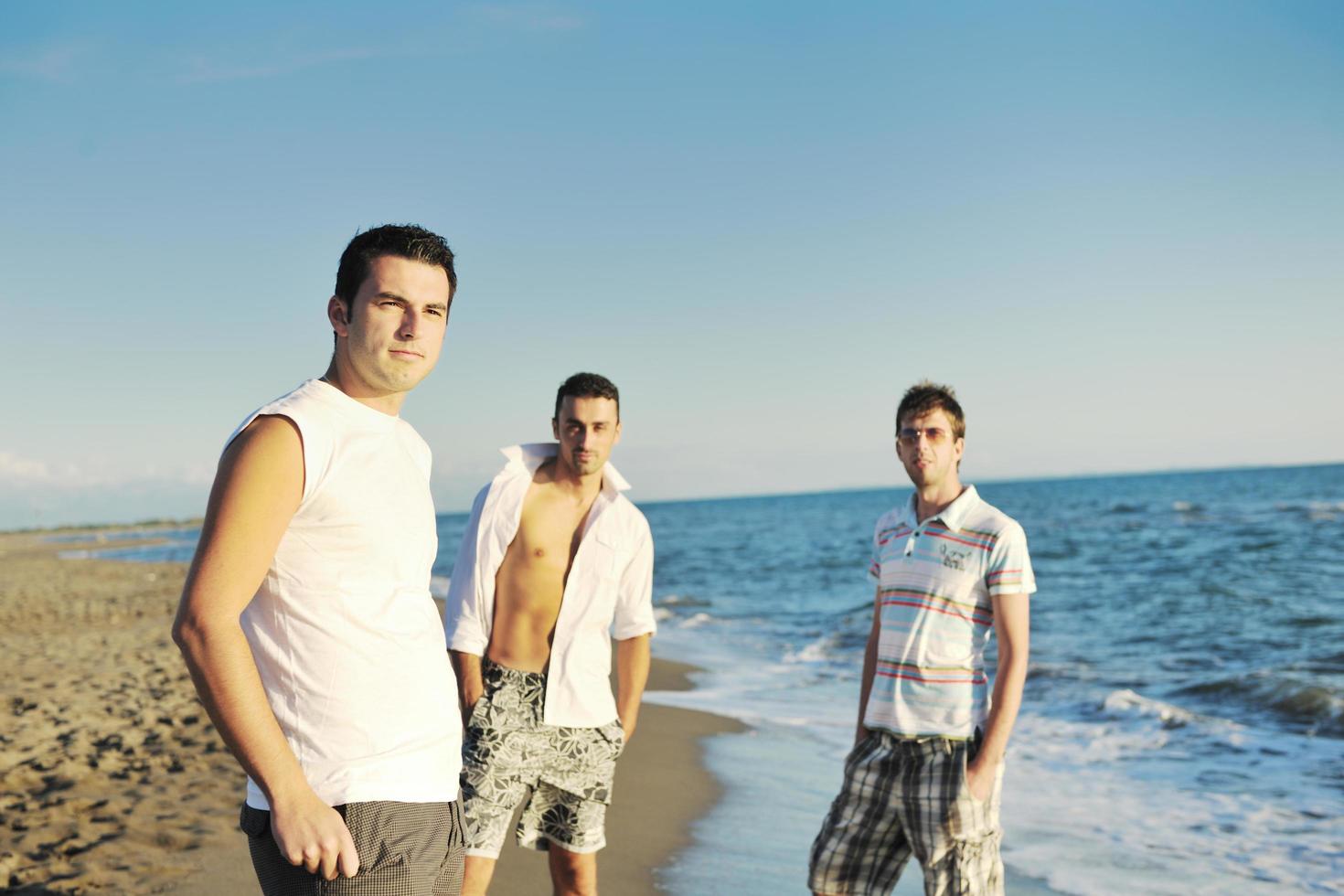 young man at beach photo