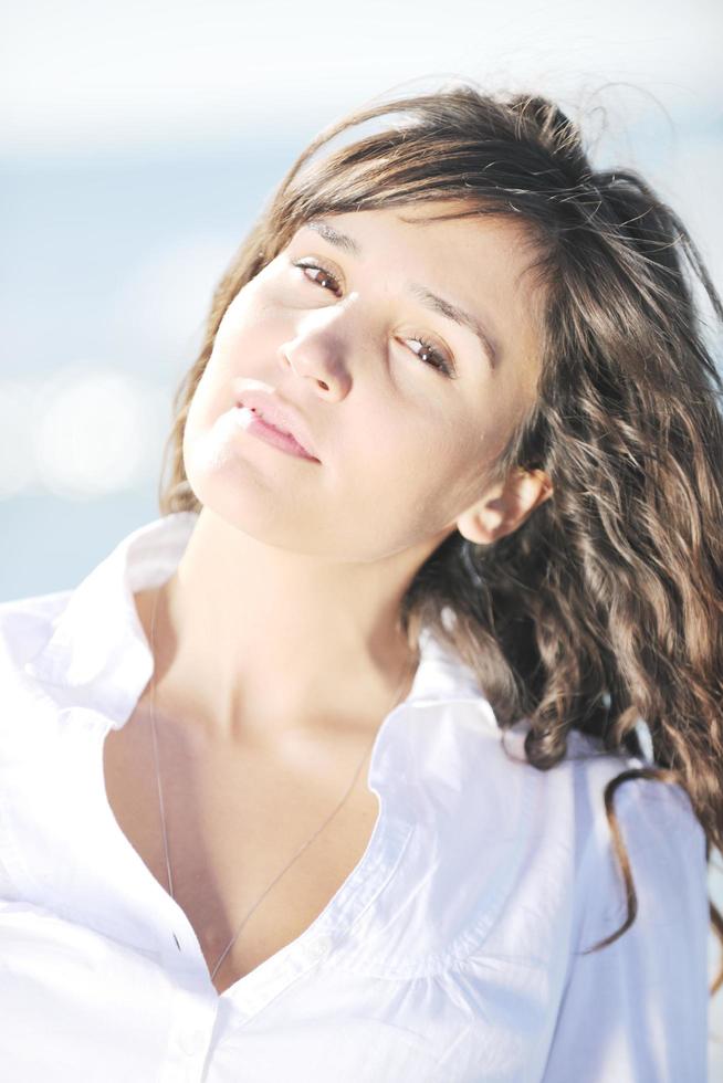 happy young woman on beach photo