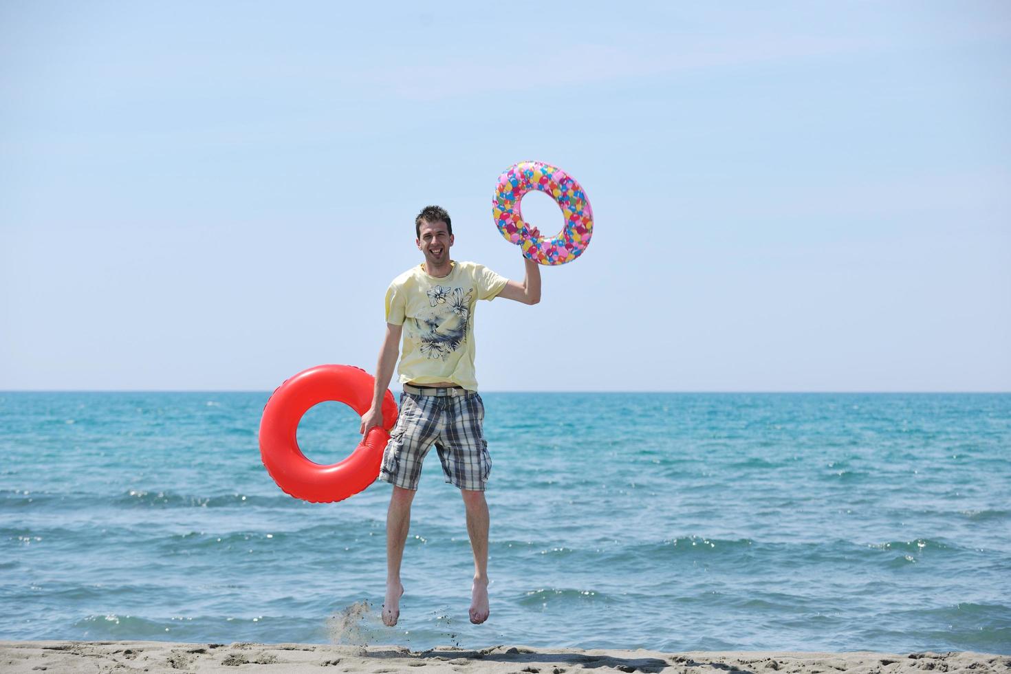 man relax on beach photo